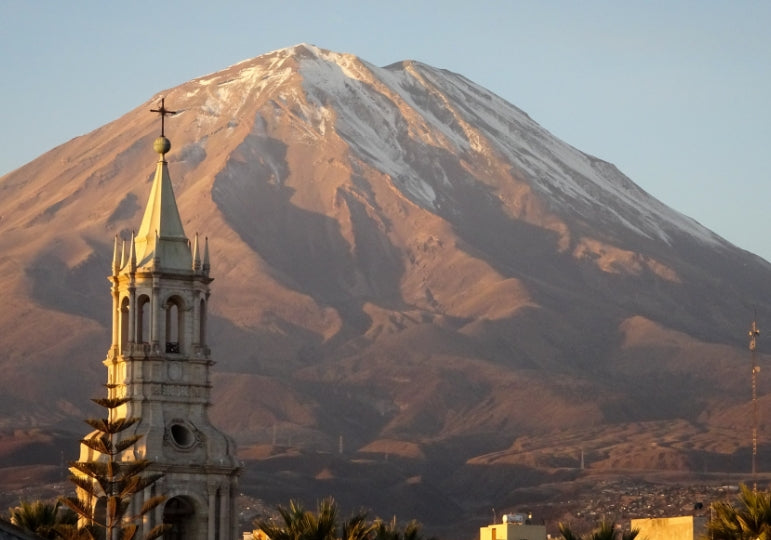 an image of the misti volcano in Arequipa Peru while also having the cathedral in shot